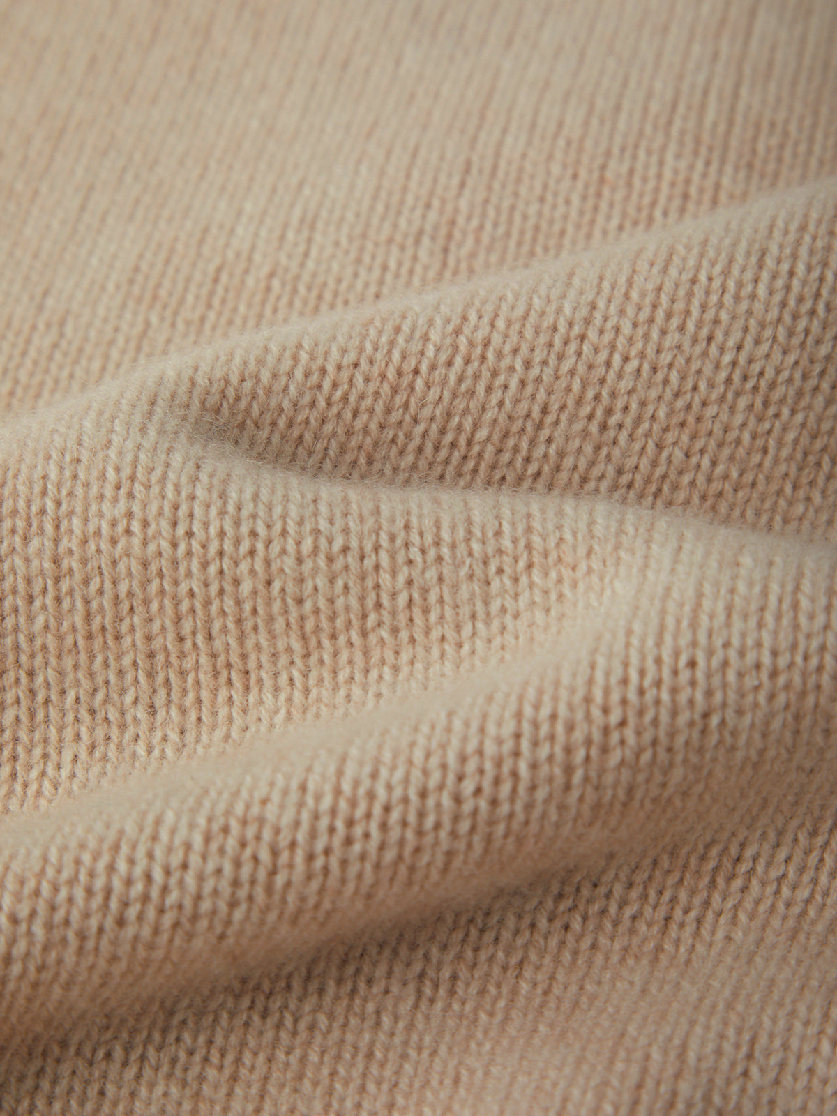 Close-up of beige fabric texture