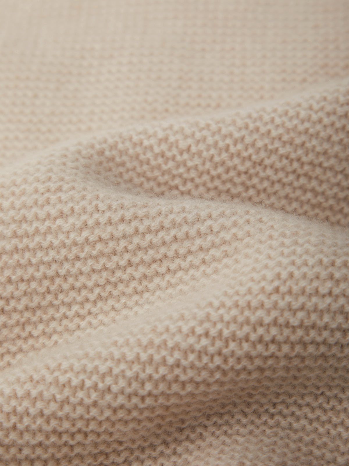 Close-up of beige fabric texture