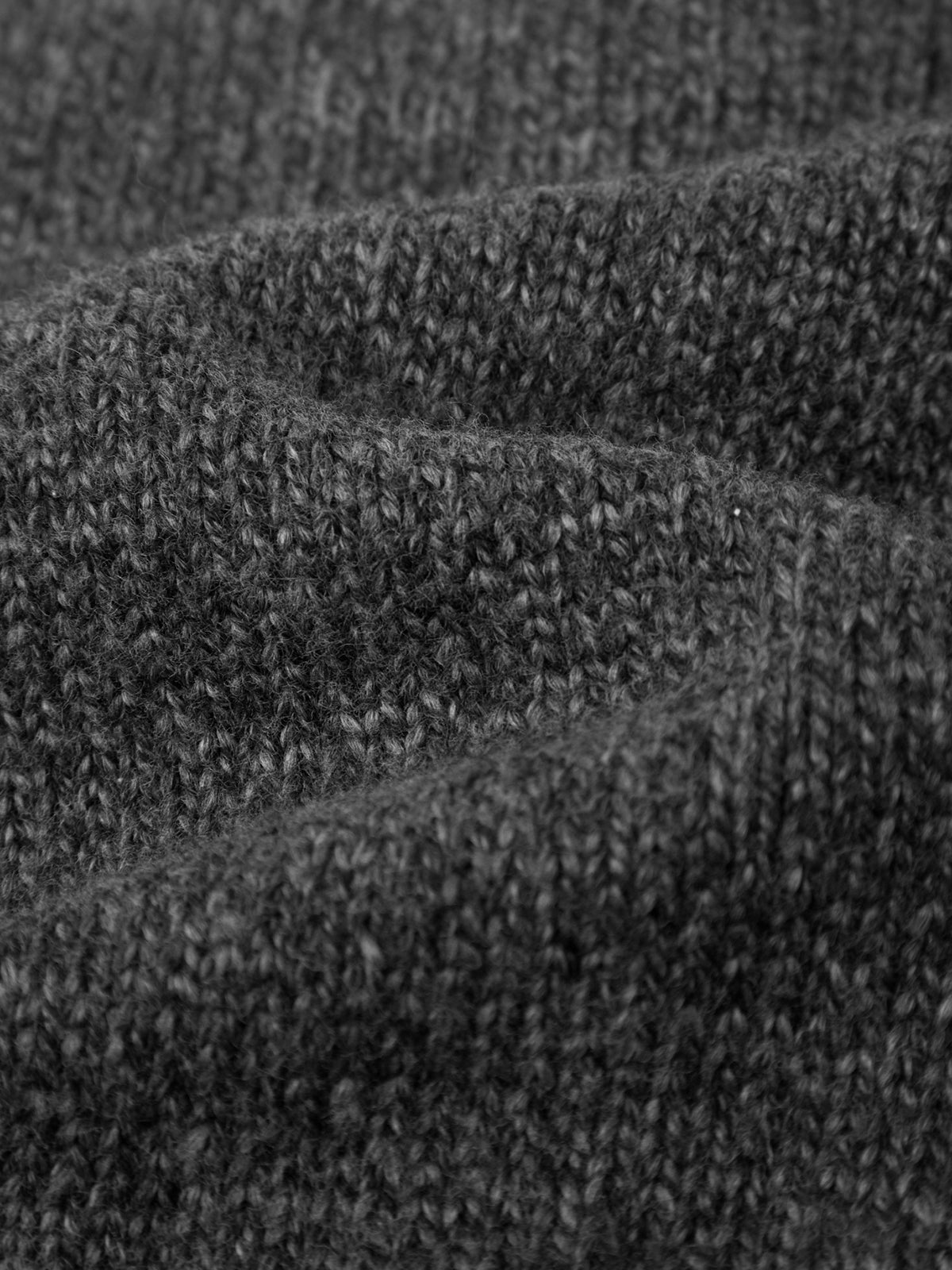 Close-up of dark gray textured fabric