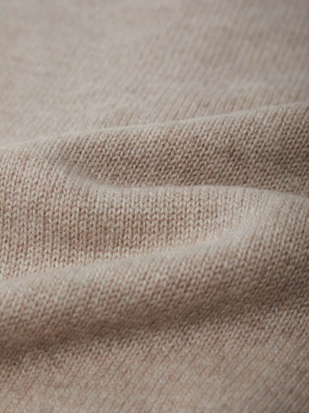 Close-up of beige fabric texture