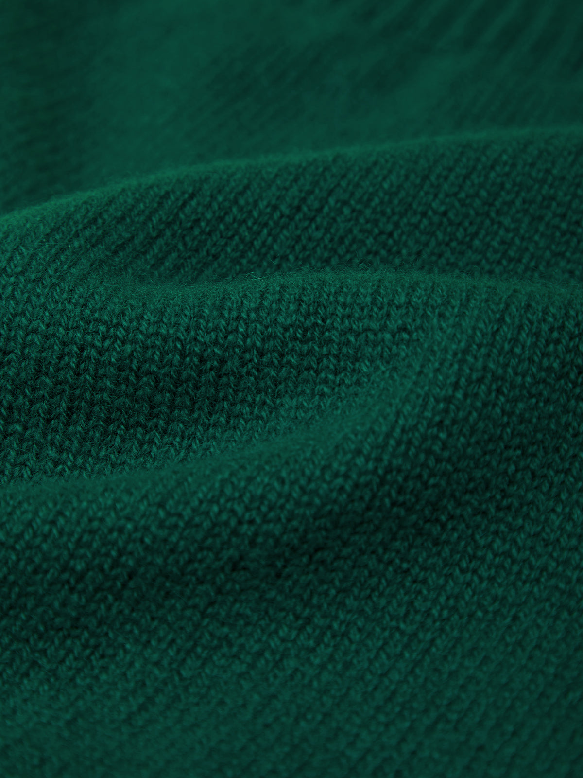 Close-up of textured green fabric
