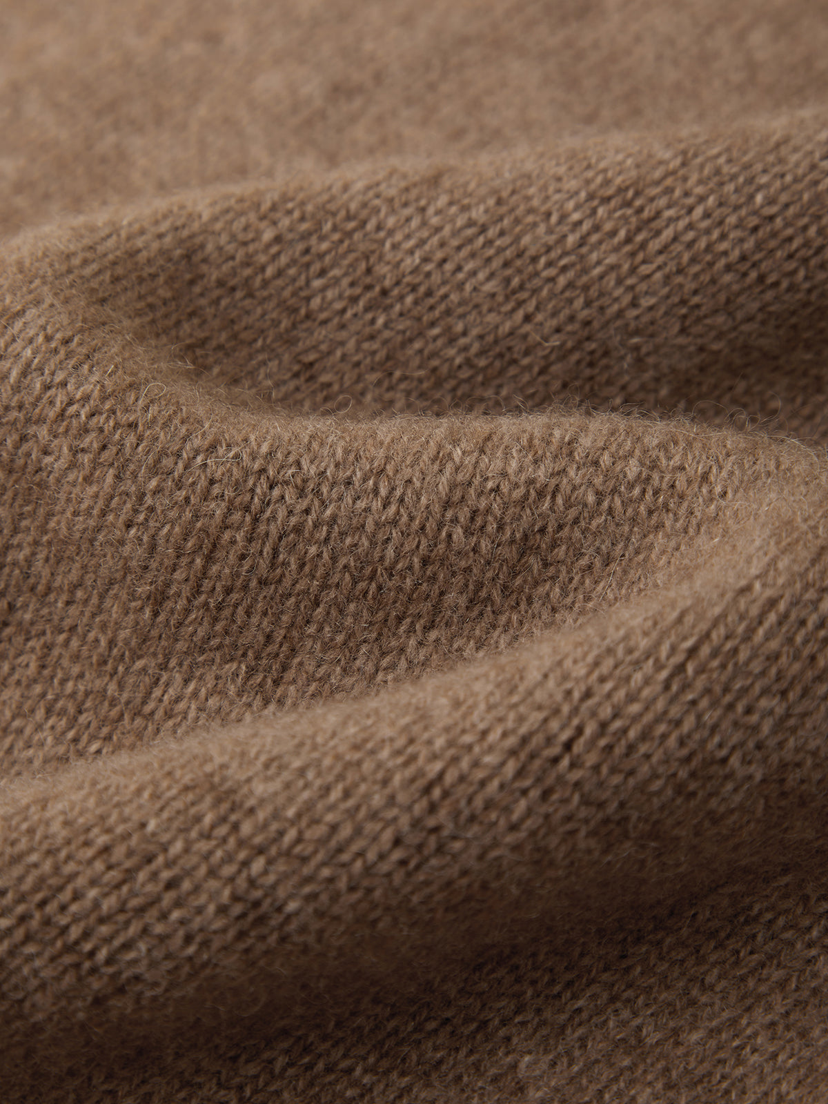 Close-up of brown fabric with a textured pattern