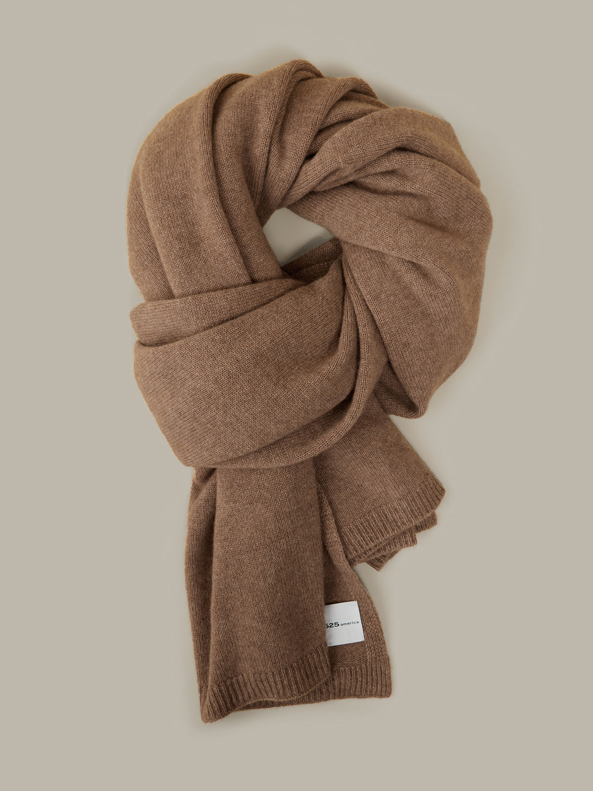 Brown scarf on a beige background